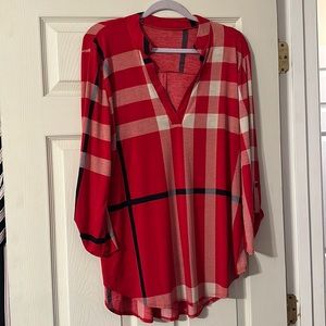 Red plaid shirt bought from a local boutique